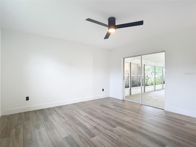 unfurnished room with ceiling fan and light hardwood / wood-style floors