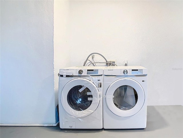 laundry area featuring independent washer and dryer