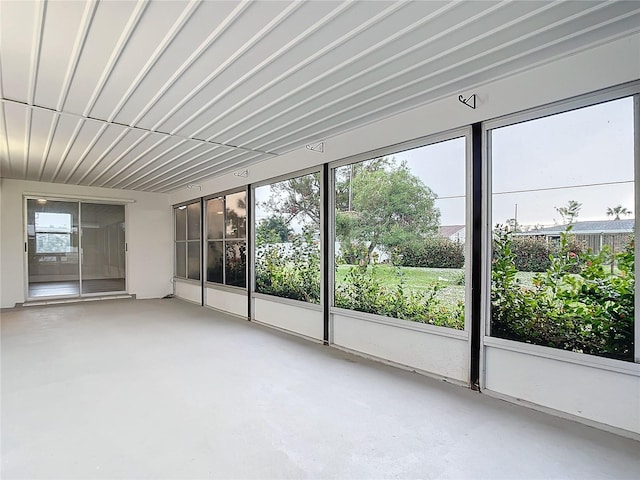 unfurnished sunroom with a healthy amount of sunlight