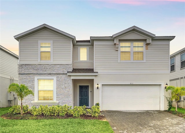 view of front of house with a garage