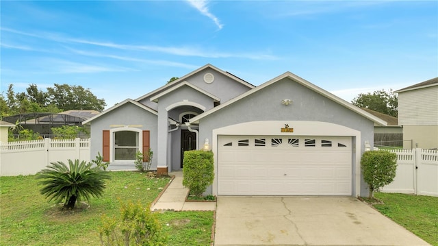 single story home featuring a front yard and a garage