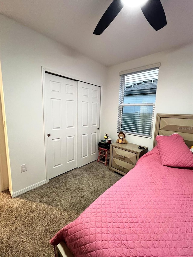 bedroom featuring carpet flooring, ceiling fan, and a closet