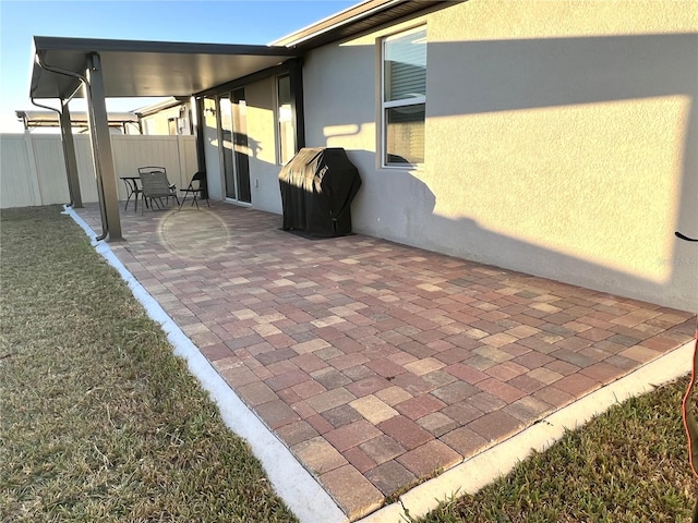 view of patio with a grill