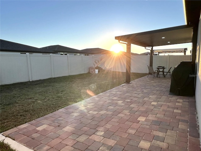 patio terrace at dusk with grilling area