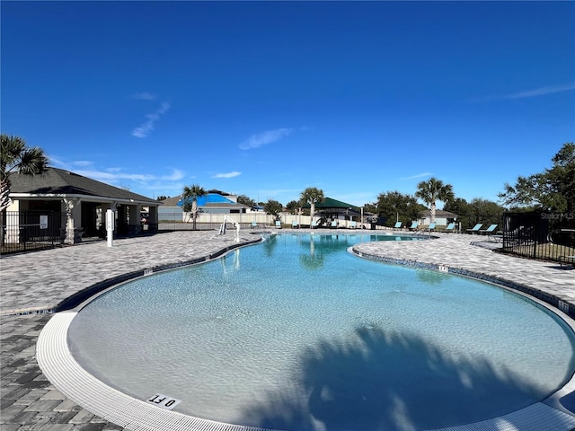 view of swimming pool featuring a patio