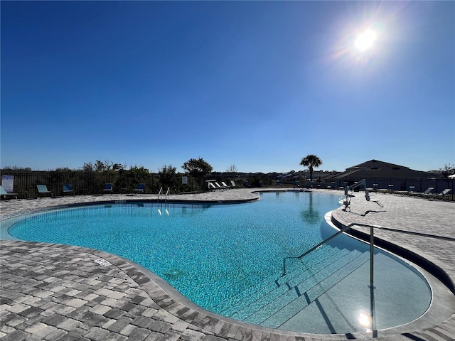 view of pool featuring a patio area