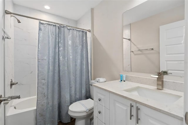 full bathroom featuring vanity, toilet, and shower / bath combo