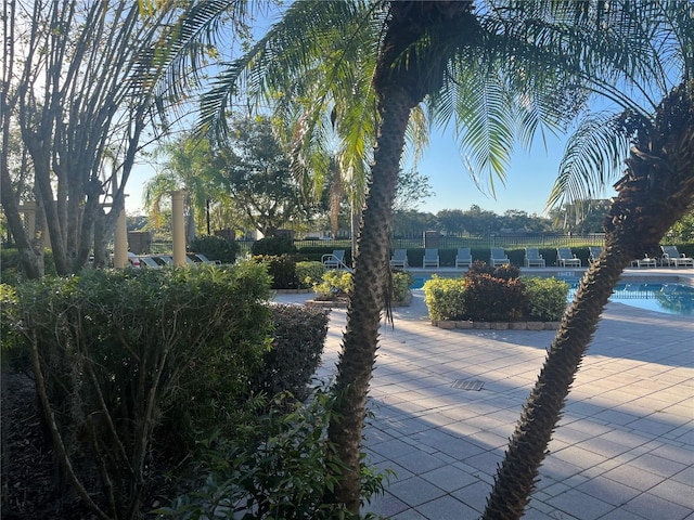 view of property's community featuring a pool