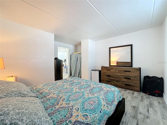 bedroom featuring light hardwood / wood-style flooring