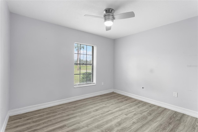 unfurnished room featuring ceiling fan and light hardwood / wood-style flooring