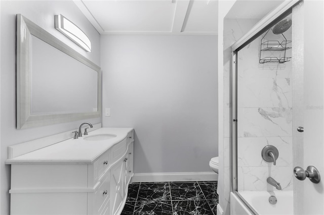 full bathroom featuring toilet, vanity, and shower / bath combination with glass door