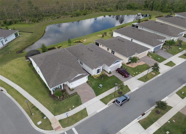 drone / aerial view with a water view