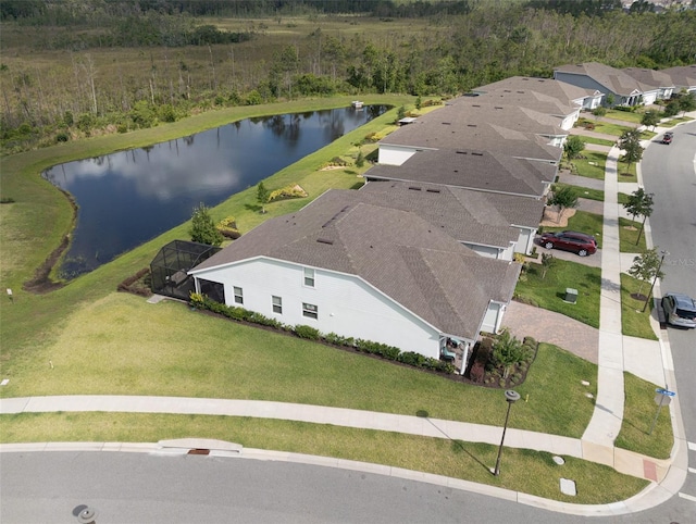 bird's eye view with a water view