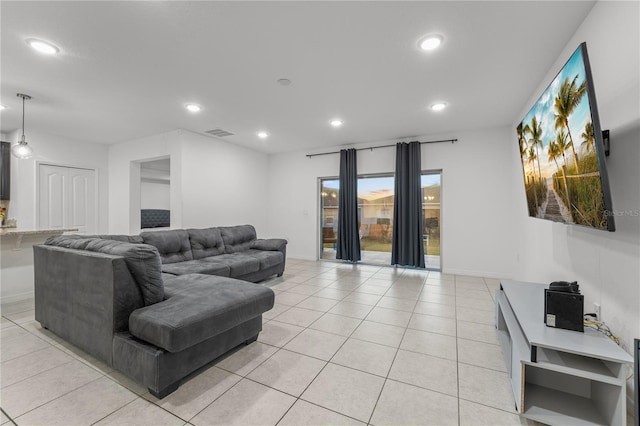 living room featuring light tile patterned flooring