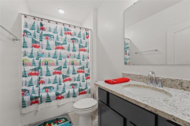 full bathroom with tile patterned floors, vanity, toilet, and shower / tub combo with curtain