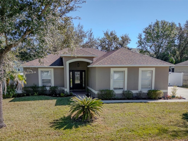 view of front of home featuring a front lawn