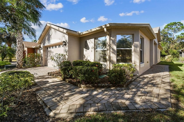 view of home's exterior featuring a garage