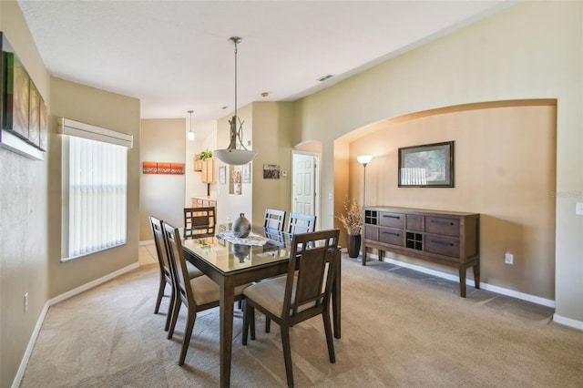 view of carpeted dining area