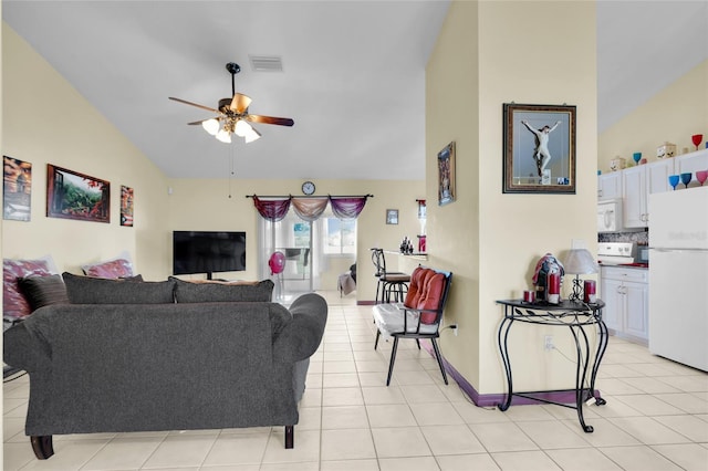 living room featuring ceiling fan, light tile patterned floors, and high vaulted ceiling