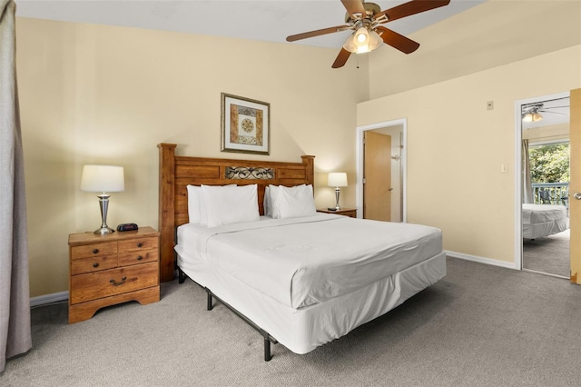 carpeted bedroom with ceiling fan and lofted ceiling