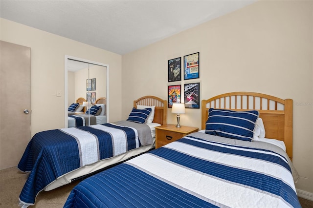 carpeted bedroom featuring a closet