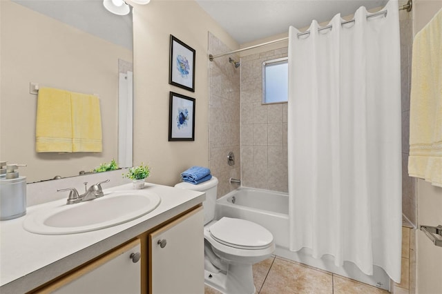 full bath with shower / tub combo with curtain, vanity, toilet, and tile patterned floors