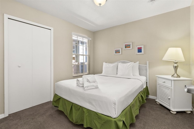 carpeted bedroom featuring a closet