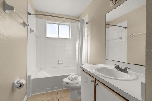 full bathroom with shower / bath combo with shower curtain, tile patterned flooring, vanity, and toilet