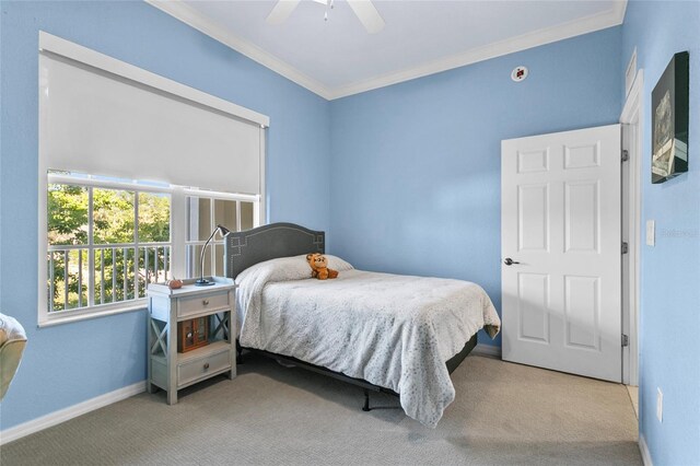 bedroom with ceiling fan, light colored carpet, and ornamental molding