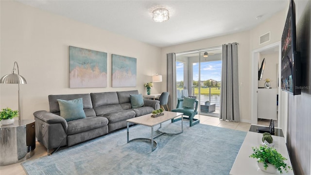 living room featuring light tile patterned floors