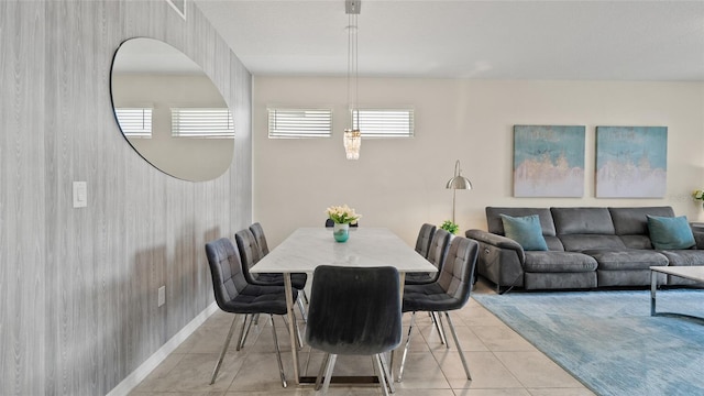 dining space with light tile patterned floors