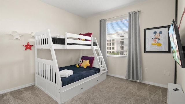 bedroom featuring light carpet