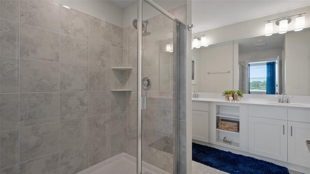 bathroom with vanity and walk in shower