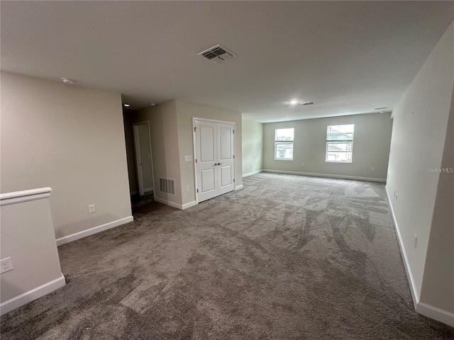 unfurnished room featuring carpet floors