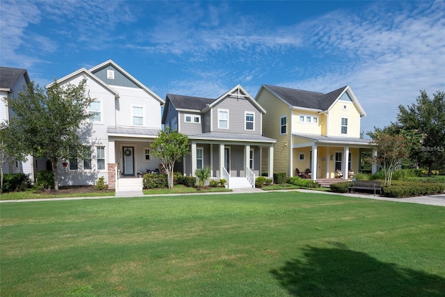 view of front of home with a porch and a front lawn