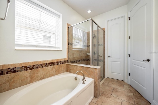 bathroom with plus walk in shower and tile patterned floors