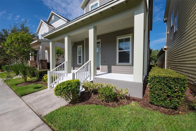 doorway to property featuring a porch