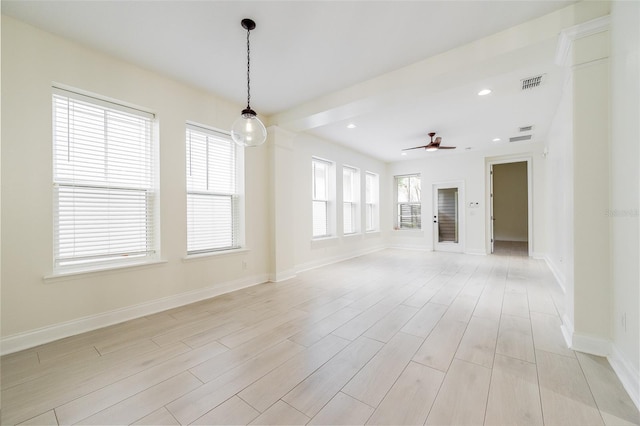 unfurnished living room with visible vents, baseboards, recessed lighting, a ceiling fan, and light wood finished floors