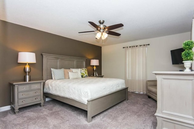 bedroom with ceiling fan and light colored carpet