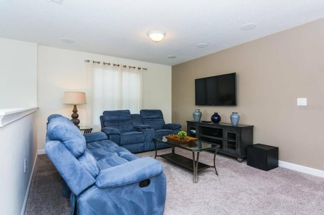 living room featuring light carpet