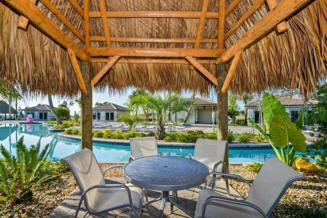 view of swimming pool with a gazebo