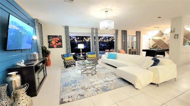 living room with billiards, light tile patterned flooring, and a chandelier