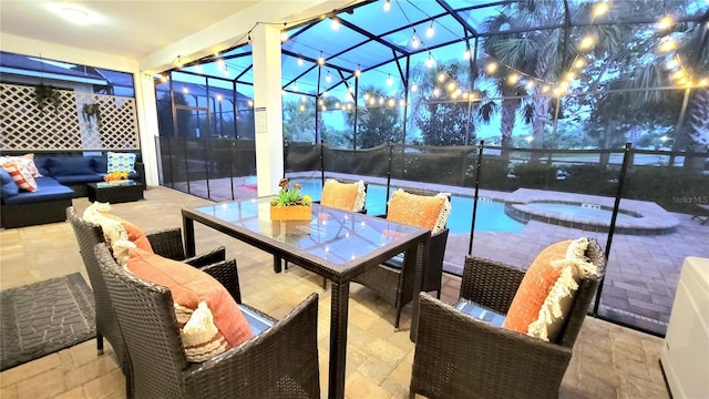 view of patio / terrace featuring a lanai, an outdoor hangout area, and a swimming pool with hot tub