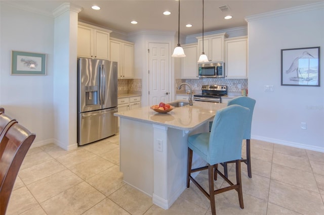 kitchen with sink, ornamental molding, tasteful backsplash, decorative light fixtures, and stainless steel appliances