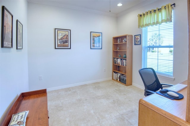 office area with light tile patterned flooring and crown molding