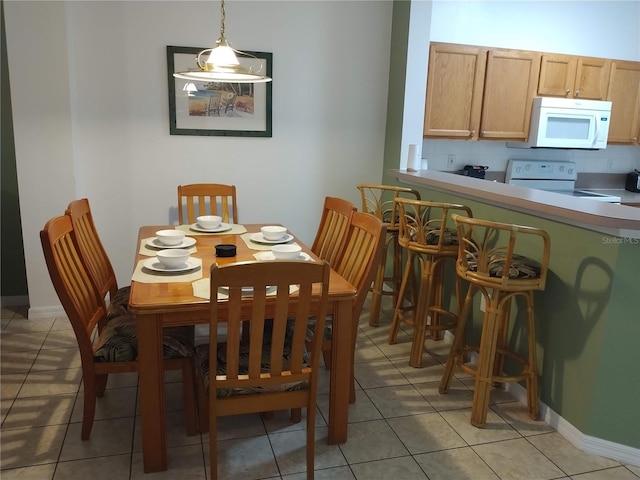 view of tiled dining room