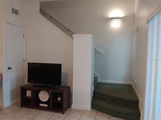 staircase with tile patterned flooring