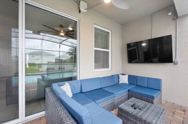 exterior space featuring ceiling fan and an outdoor hangout area