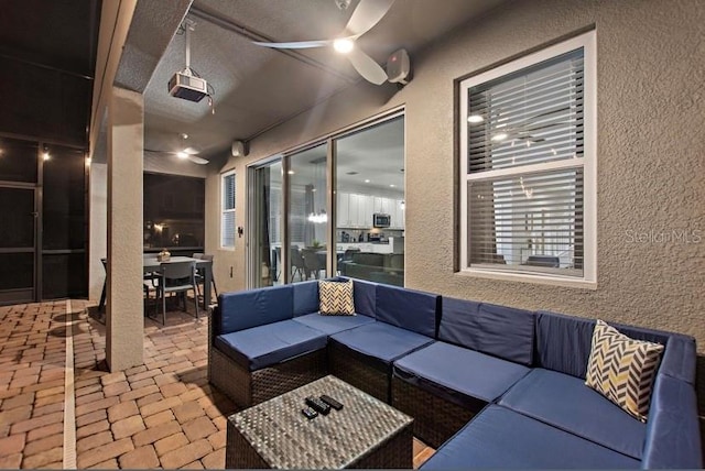 view of patio / terrace with an outdoor hangout area and ceiling fan