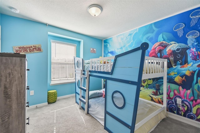 bedroom with carpet flooring and a textured ceiling